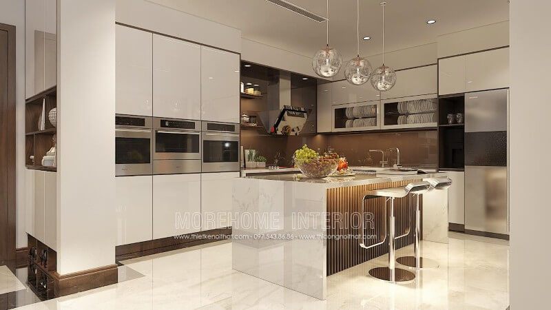 Tủ bếp chữ L được thiết kế hiện đại với tone màu trắng chủ đạo, tạo nên một không gian sang trọng và tinh tế, đảm bảo đẳng cấp cao.